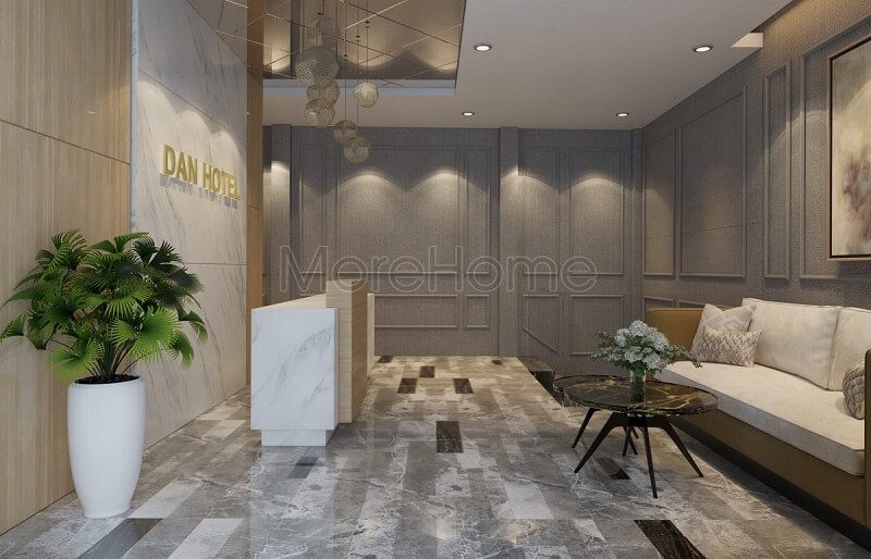 Bộ sofa bọc vải màu trắng cao cấp cung cấp vẻ đẹp tinh tế và sang trọng cho quầy lễ tân của khách sạn.
